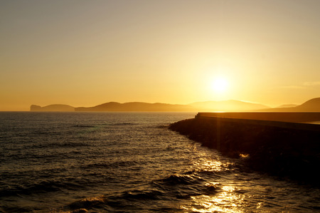 beautiful sunset in Alghero, Sardinia, Italyの写真素材