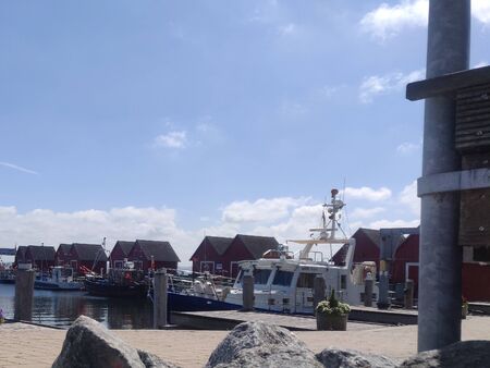 A small, idyllic fishing village in the harbor of the Baltic Sea.