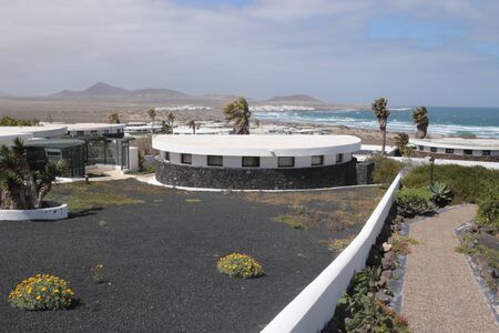 Holiday village and the beach of Famara, Lanzarote, Canary Islands, Spain. The so called Norwegian Settlement.のeditorial素材