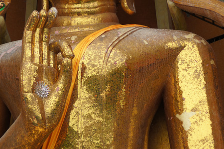 KANCHANABURI THAILAND - August 14, 2016: "Wat Tham Suea " Gold big buddha statue, seated in the posture of giving blessings, Travel guide of Kanchanaburi.のeditorial素材