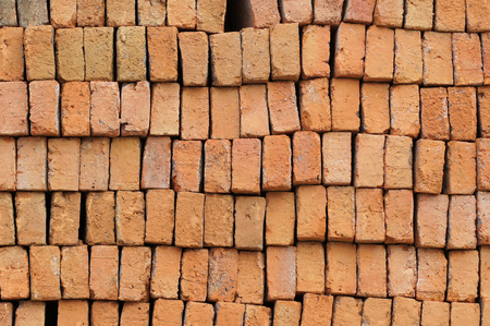 Red bricks are stacked together in one beautiful package.の写真素材