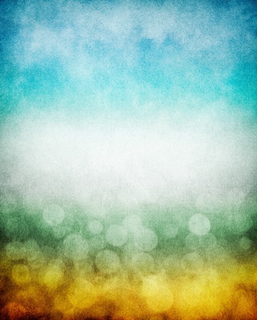 Fog, mist, and clouds with a yellow to blue gradient and boken effects. Image has a pleasing paper texture and grain pattern visible at 100%. Fog, mist, and clouds with a yellow to blue gradient and boken effects. Image has a pleasing paper texture and grain pattern visible at 100%.