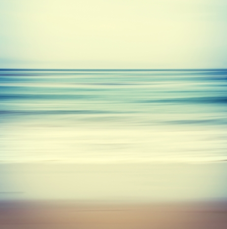 An abstract ocean seascape with blurred panning motion   Image displays a retro, vintage look with cross-processed colors の写真素材
