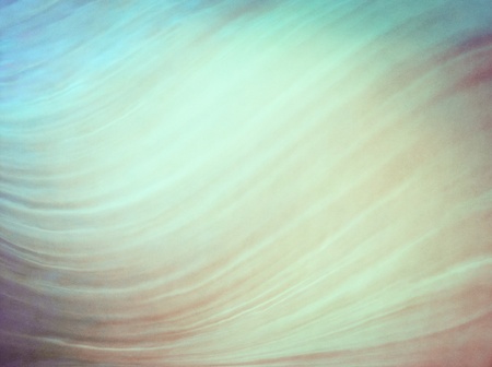 A water abstraction with cross-processed colors.  Image displays a pleasing grain pattern at 100 percent.の写真素材