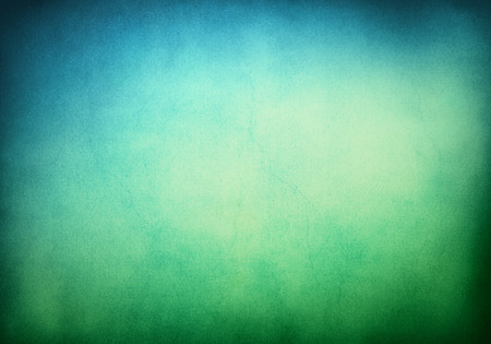 A textured grunge background with a green to blue gradient.  Image displays significant paper grain and texture when viewed at 100 percent.