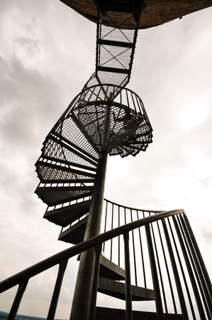 Spiral staircase in the skyの写真素材