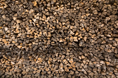 Stacked, chopped wood ready for the winter in germanyの写真素材