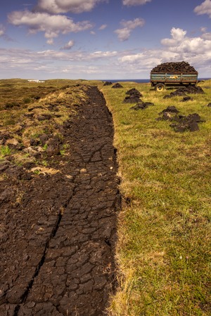 freshly cut fields of peat or turf from Scottish raised bog, peat removal, Durness, Scottish Highlands, Scotland, United Kingdomの写真素材