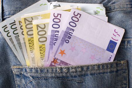  Close-up of the fan Euro banknotes in jeans pocket.  の写真素材