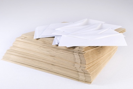 Pile of envelopes over white background. Not isolated.の写真素材