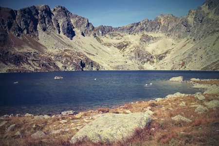 A large stone on the banks of the Hinc lake in the High Tatras.の写真素材
