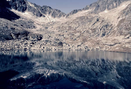 High Tatras - Large Spis Lake with typical mirroring on the water surface.の写真素材
