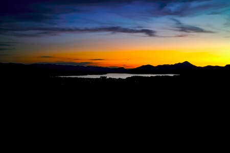 A beautiful colorful sky over the Liptovska Mara dam at sunset.の写真素材