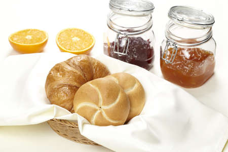 Roll with jam and table decorationsの写真素材