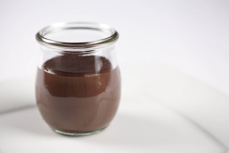 Chocolate pudding on plateの写真素材