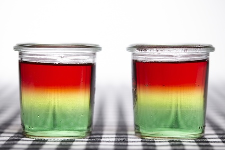 Traffic light jello made of three layers jello: green (woodruff), yellow (lemon) and red (raspberry).の写真素材