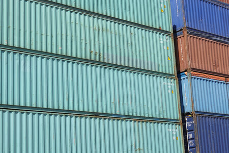 A pile of containers in the Port of Hamburg taken at bright sunlight on May 17, 2014.