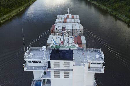 The container vessel Sonderborg Strait on the Kiel Canal near Beldorf (Schleswig-Holstein, Germany)...
