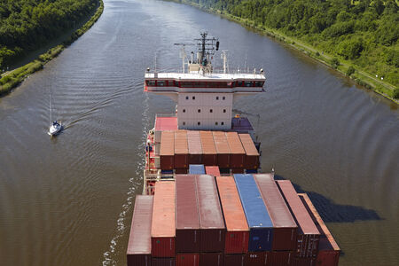 The container vessel Alexander B at the Kiel Canal near Beldorf (Germany, Schleswig-Holstein) taken...