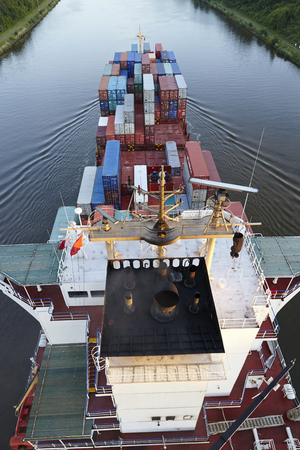The container vessel Wybelsum at the Kiel Canal near Beldorf (Germany, Schleswig-Holstein) taken on...