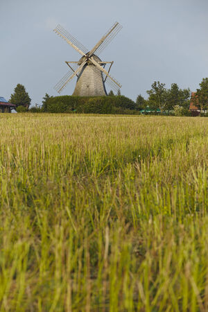 The windmill Destel (Stemwede, Germany) is a dutch type of windmill and is part of the Westphalia Mill Street (Westfaelische Muehlenstrasse).の写真素材