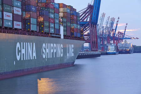 The container vessel CSCL Star is loaded / unloaded the terminal Eurogate in the deepwater port Hamburg-Waltershof on August 8, 2014. のeditorial素材