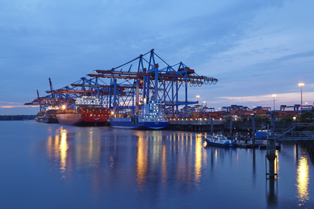 The container vessels Rio Blanco (Hamburg Sued) and Aurora are loaded / unloaded at the terminal Burchardkai in the deepwater port Hamburg-Waltershof on August 8, 2014. のeditorial素材
