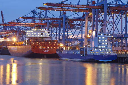 The container vessels Rio Blanco (Hamburg Sued) and Aurora are loaded / unloaded at the terminal Burchardkai in the deepwater port Hamburg-Waltershof on August 8, 2014. のeditorial素材