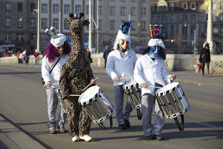 The Carnival at Basel (Basle - Switzerland) in the year 2013. The picture shows some costumed people on February 18, 2013.のeditorial素材