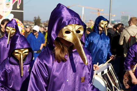 The Carnival at Basel (Basle - Switzerland) in the year 2013. The picture shows some costumed people on February 18, 2013.のeditorial素材