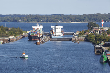 The container vessels Grete Sibum and Conmar Island at the lock Kiel-Holtenau to the Kiel Canal taken on September 3, 2014.のeditorial素材