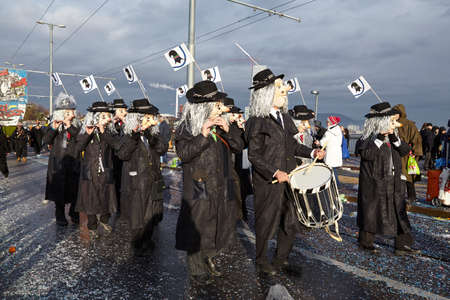 The Carnival at Basel (Basle - Switzerland) in the year 2015. The picture shows some costumed people on February 23, 2015. The Carnival at Basel (Basle - Switzerland) in the year 2015. The picture shows some costumed people on February 23, 2015.