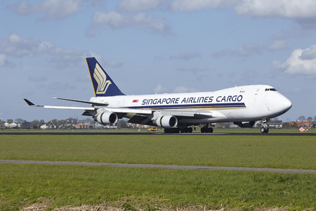 A Boeing 747-412F (SCD) of Singapore Airlines Cargo lands at Amsterdam Airport Schiphol (The Netherlands, AMS) on May 7, 2015. The name of the runway is Polderbaan.のeditorial素材