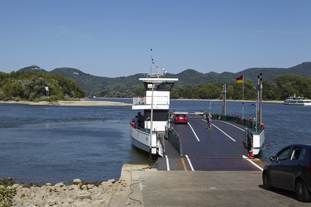 A ferry carries persons and cars across the River Rhine at Rolandseck (City Remagen, Germany, Rhineland-Palatinate) on August 31, 2015.のeditorial素材