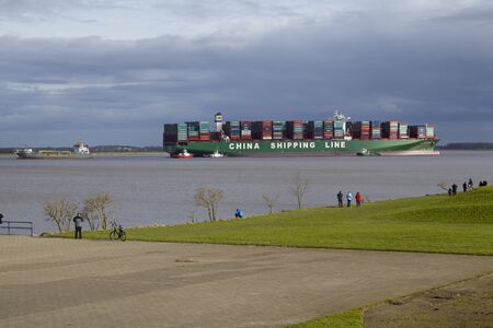 The container vessel CSCL Indian Ocean lying on ground of the river Elbe since February 3, 2016 at Steinkirchen (near Stade, Lower Saxony, Germany) on February 7, 2016.のeditorial素材