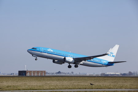 The KLM Boeing 737-8K2 with identification PH-BXY takes off at Amsterdam Airport Schiphol (The Netherlands, AMS), Polderbaan on March 13, 2016.のeditorial素材