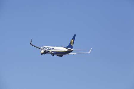 The Ryanair Boeing 737-8AS with identification EI-DAI takes off at Amsterdam Airport Schiphol (The Netherlands, AMS), Polderbaan on March 13, 2016. The aircraft is already high in the air.のeditorial素材