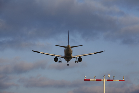 An airplane approaching Frankfurt International Airport (Germany, FRA) on February 16, 2016.のeditorial素材