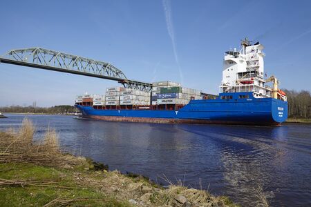 The container vessel Wybelsum at the Kiel Canal near Hochdonn (Germany, Schleswig Holstein) on April...