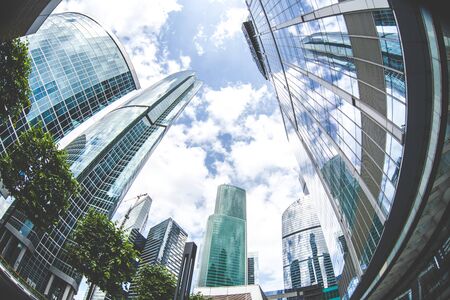 urban street landscape of city skyscrapers, fish eye, down pointの写真素材