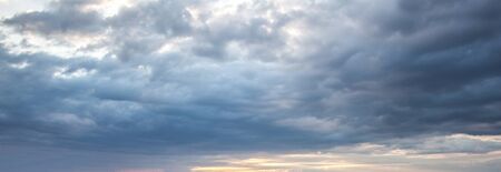 sky with dark clouds after stormの写真素材