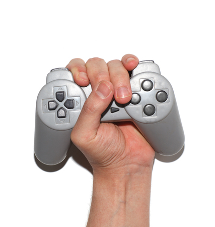 male hand squeezes gamepad isolated on white background