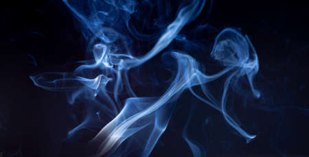 blue jet wave of smoke isolated on black background