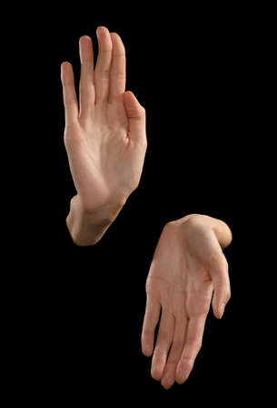 Sign Language Concept, shot of women hands on black background