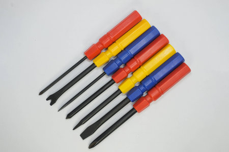 Colorful screwdriver head set isolated in whiteの写真素材