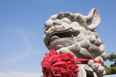 The Chinese Stone Lion at Wat Phananchoengの写真素材
