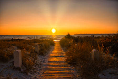 Sunrise, sunset at the Baltic Sea on the island of Ruegenの写真素材