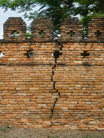 Cracking on ancient wallの写真素材