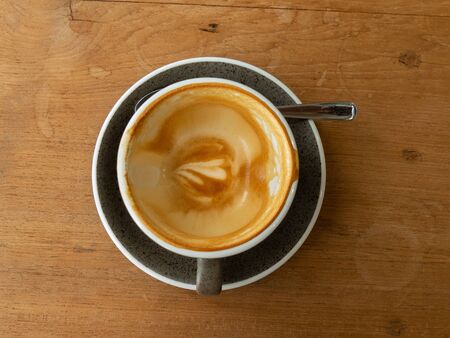 Used ceramic coffee cupの写真素材