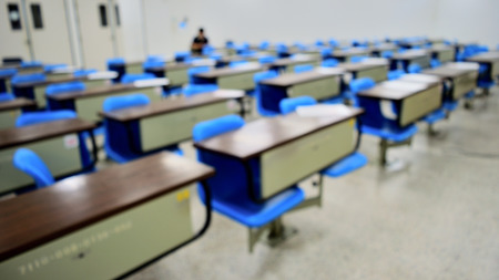 Blurred classroom in campus with noise and gain.